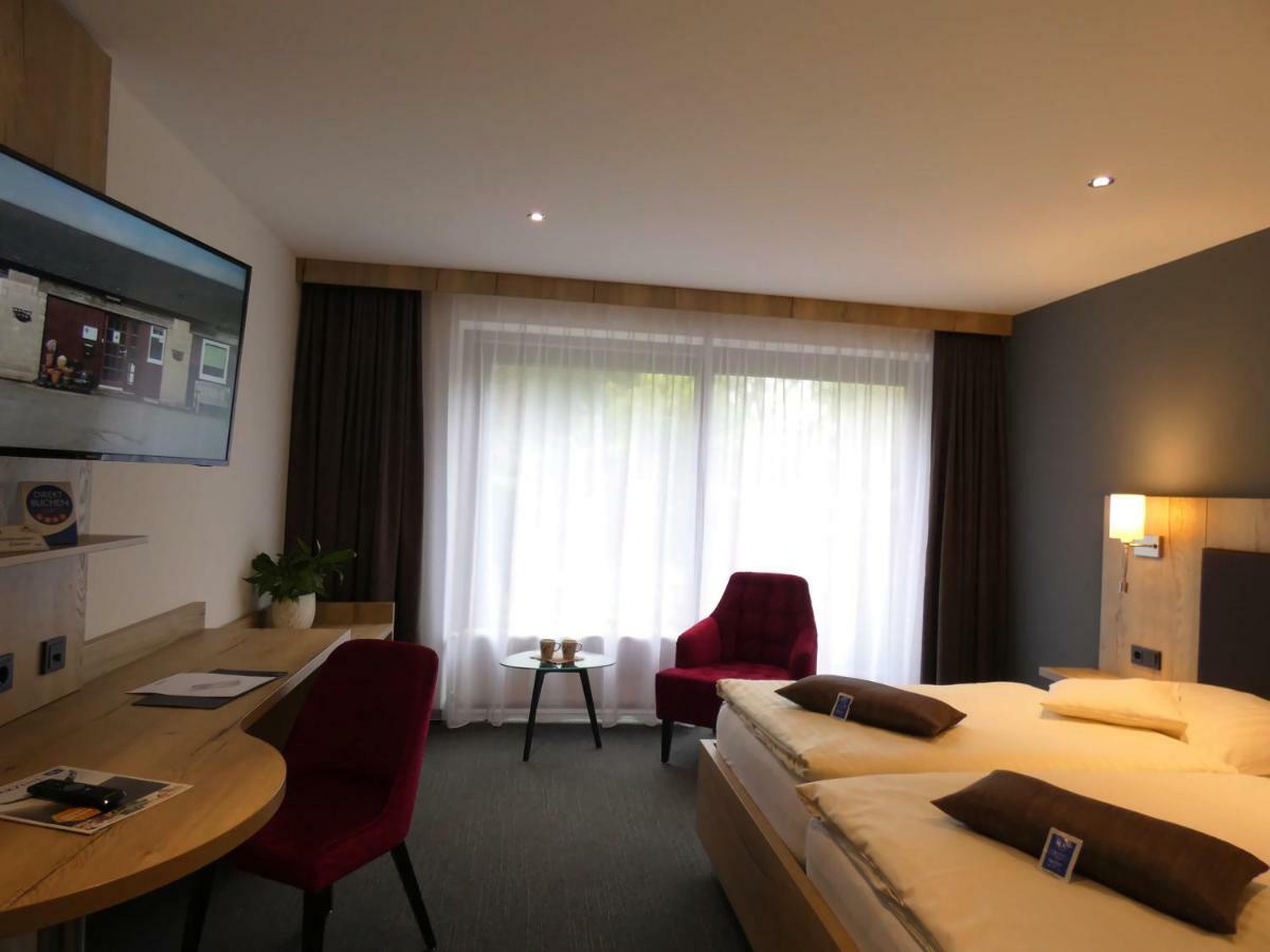 Akzent Hotel Cordes & Restaurant Am Rosengarten Sottorf ภายนอก รูปภาพ