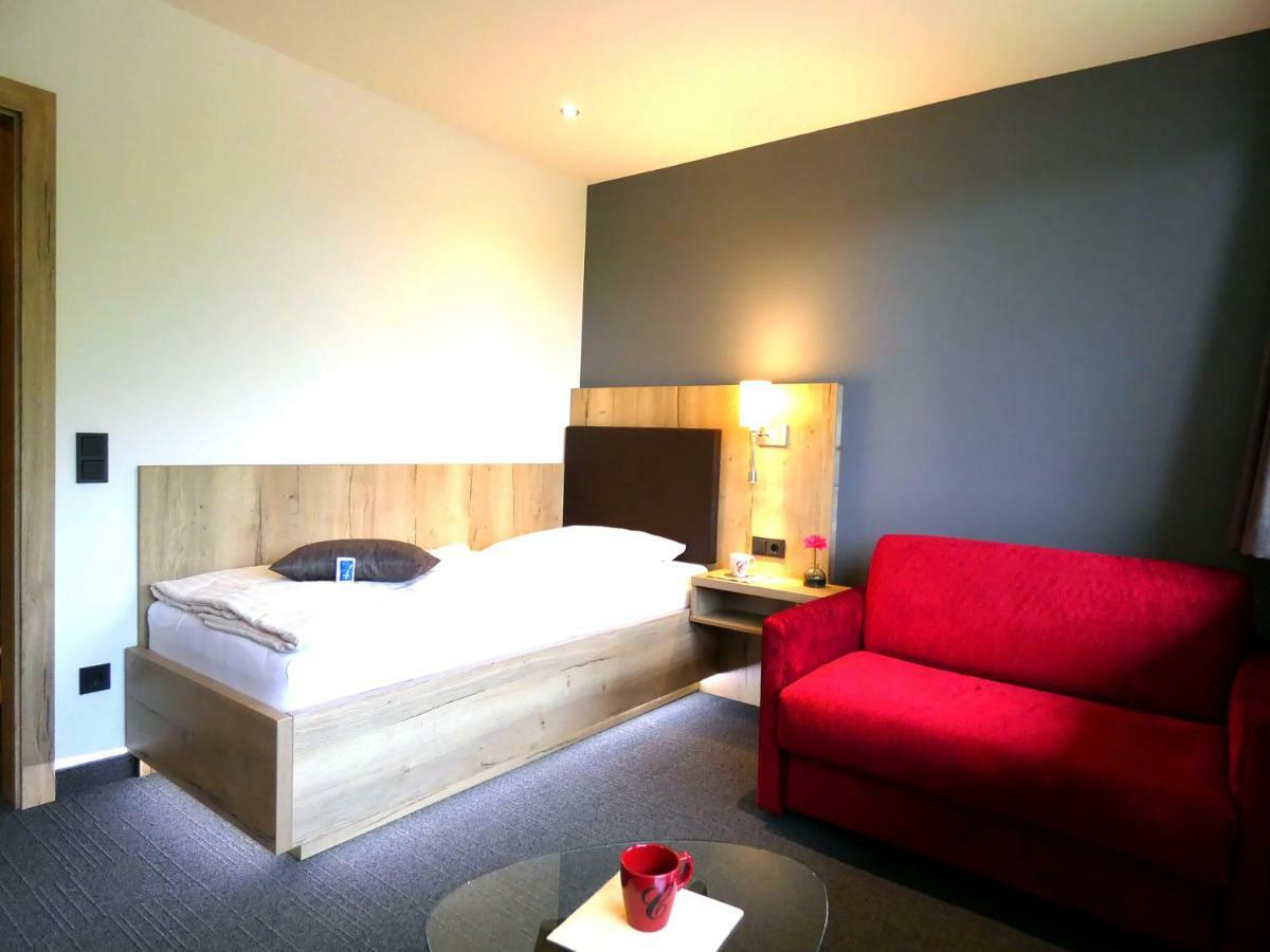 Akzent Hotel Cordes & Restaurant Am Rosengarten Sottorf ภายนอก รูปภาพ
